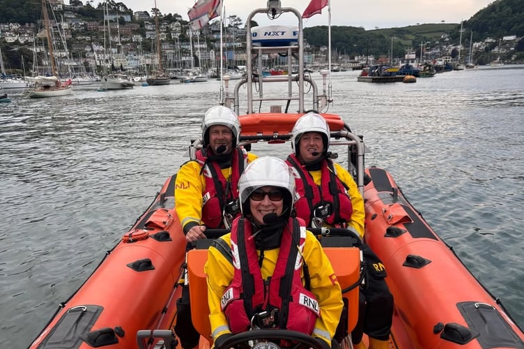 RNLI Chief Operating Officer and Director of Regions Leanna Lakes (centre), with crew members Stuart Millard (L) and Mark Conroy. Image: Rich Eggleton