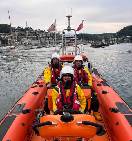 RNLI Chief Operating Officer and Director of Regions Leanna Lakes (centre), with crew members Stuart Millard (L) and Mark Conroy. Image: Rich Eggleton