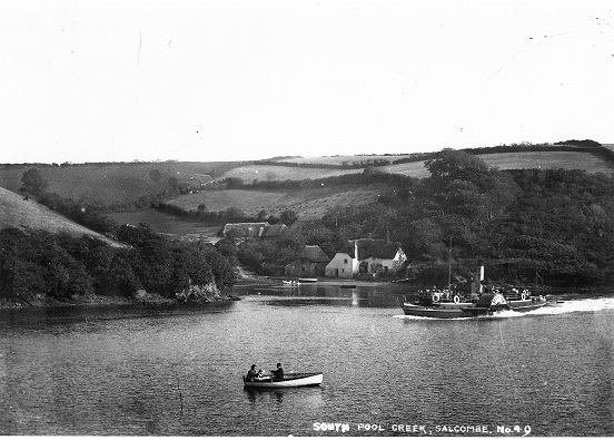Paddle steamer  "Ilton Castle"passing the Gullet, South Pool Creek . Gullet Farm in background, small rowing boat with three people in foreground