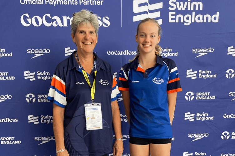Kingfishers Head Coach Karen Dorey alongside star swimmer Chloe