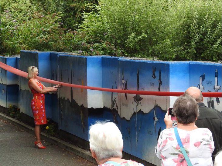 Janine Jansen cuts the ribbon to unveil Modbury's Marvelous Mural