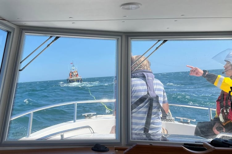 Powerboat under tow