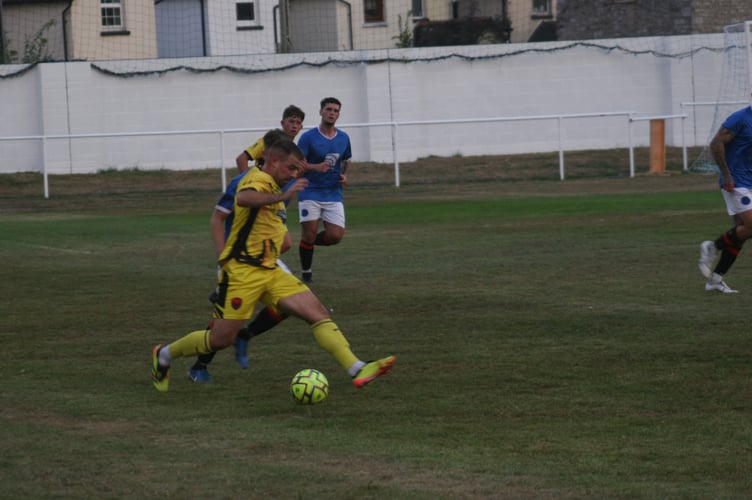 Jamie Down on the ball for Stoke Gabriel TP