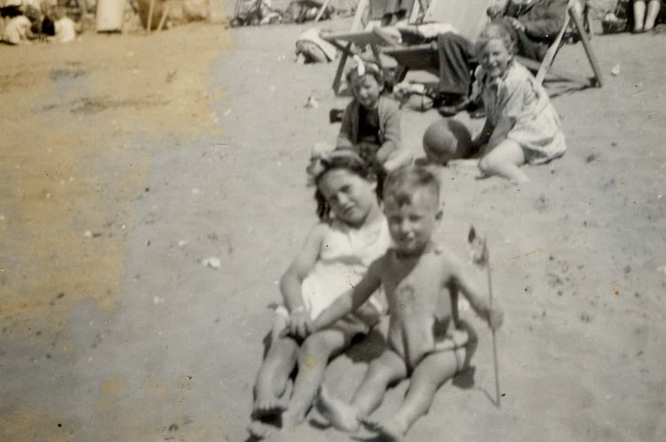 Photograph from the family of Alphaeus Ball. 
The O'Hara children on a beach,  1949.