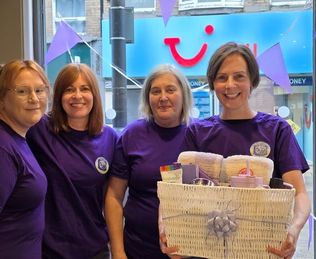 Totnes opticians complete dementia awareness walk