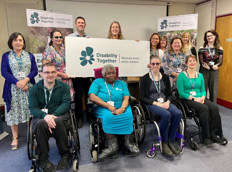 Disability Together team including Stephanie Lewis CEO centre back of photo