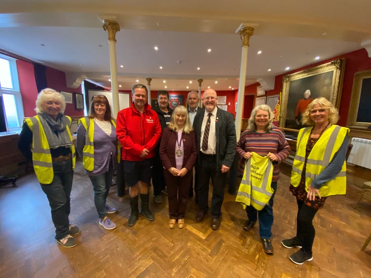 From left: members of the Dartmouth Green Partnership, Jonathan Scott Tucker, Michael Sutton Cellars, Dartmouth Mayor Cllr Andrea Cates, Carl Farrell, Peter Adolphus of River Dart Rotary, and more members of the Dartmouth Green Partnership.