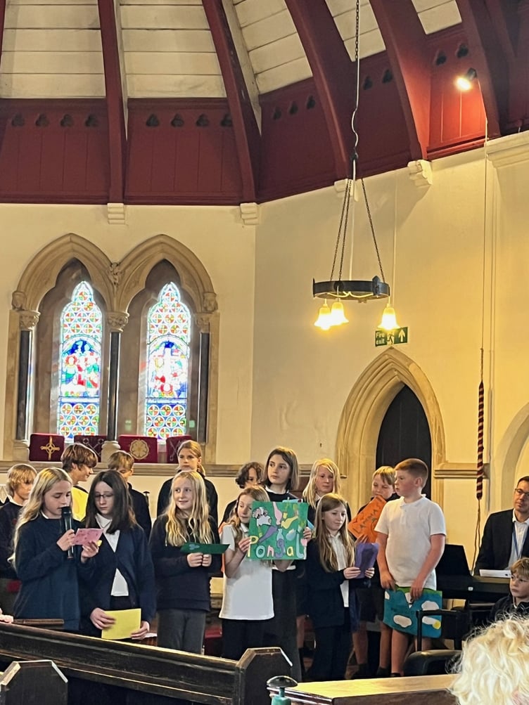 Pupils join in with Harvest Festival