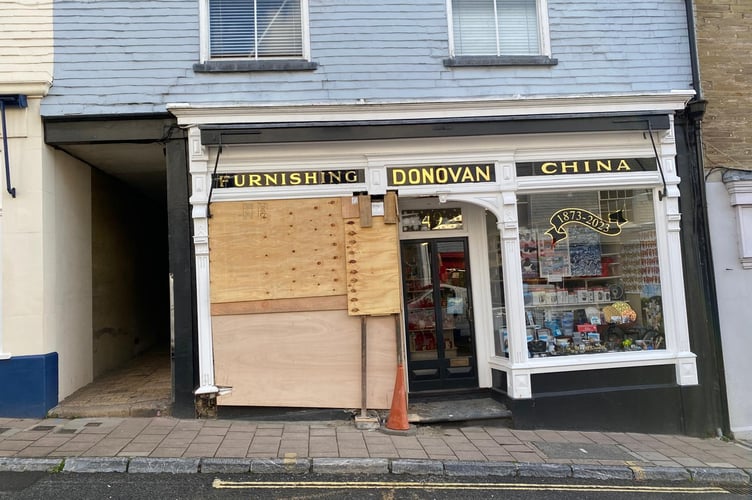 The shop is currently boarded up