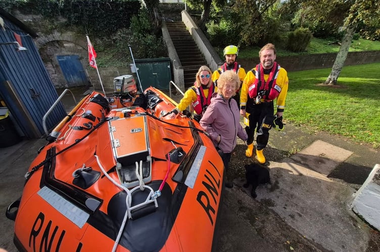 Felicity with dog Lucca and the crew