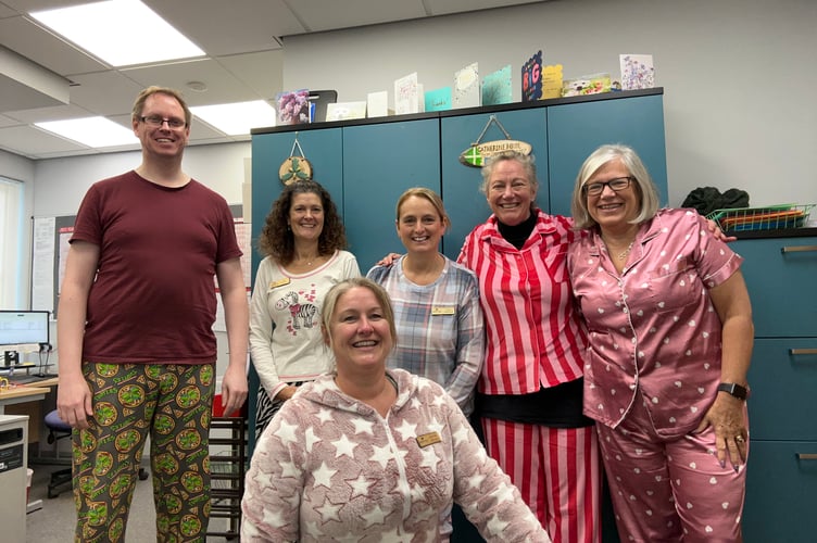Totnes Caring Pyjama day. (Front) Charlotte Higman (Back left to right) James Cooper, Fay Roblin, Lisa Perrot, Nicky Stapells, Sheila Lamkin).