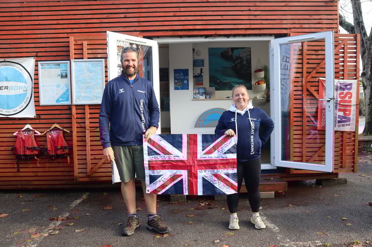 Crispin Jones and Rachel Booton in their Team GB sports jackets from the ICF SUP World Championships in Abu Dhabi.