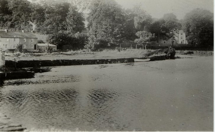 River Avon at Aveton Gifford.  Small boats in foreground.