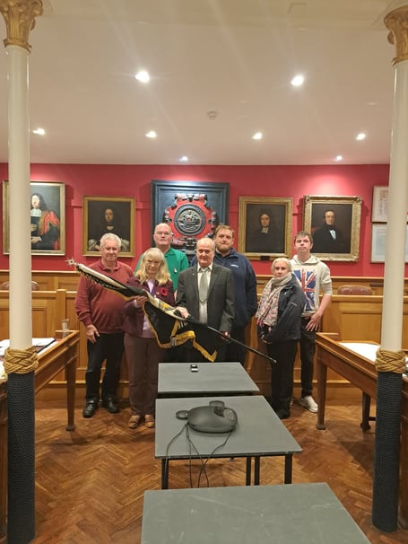 L to R back row: Former Brigade members Malcolm Matthews, Cllr Nick Davies, Ashley Winsor, Cadet Oliver Caple, L to R Front row: Mayor Cllr Andrea Cates, David Drury & former brigade member Gemma Caple