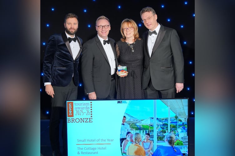 Cottage Hotel, Hope Cove, receive Bronze at Devon Tourism Awards.  L-R: Award Sponsor, Booking.com. Hotel General Manager, Neil Slade and Directors Sarah and William Ireland.