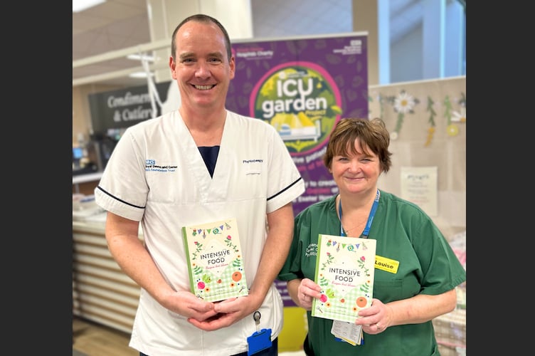 Book co-creator Louise Dalton and Garden Project Lead Andrew Lockwood with a copy of the new book.