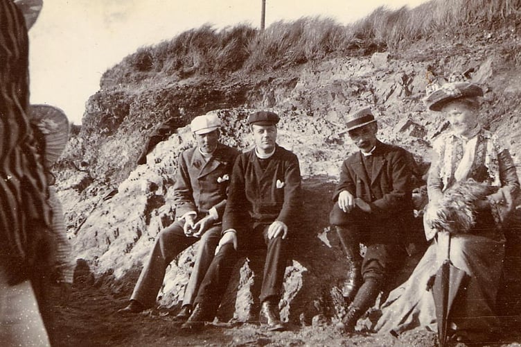 Group of people on beach. Bantham