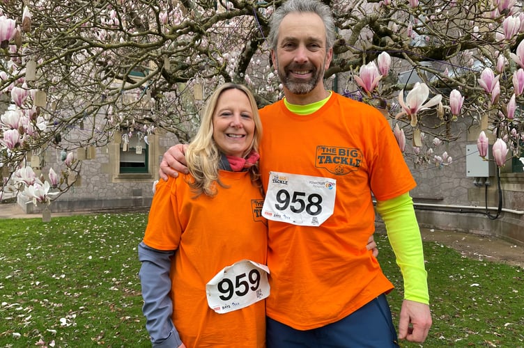 Walker Bruce Springett (53) with Suzanne Jones (54) by memory tree