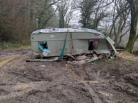 Shocked landowners discover 'mystery' abandoned caravan