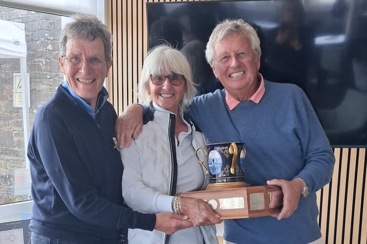 Winners of the Foundation Trophy Tricia Swindell and Peter Hartley with ladies captain Heather Spencer (left) 
