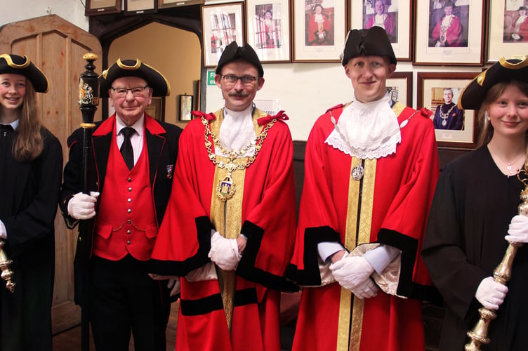 L to R: Tilly from King Edward VI Community College, Peter, the Town Sergeant, Mayor of Totnes Councillor Bennett,  Deputy Mayor Matt Trant and Ester from Totnes Independent School