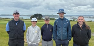 Junior and senior golfers in match action for Thurlestone