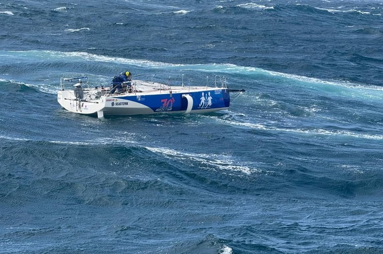 A 45-foot yacht with a jammed winch and fore sail