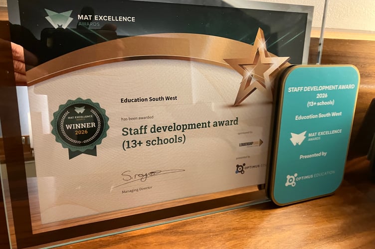 The Staff Development Award sits proudly on the shelf