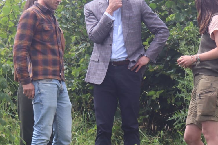 HRH hearing about how they cultivate strawberries without the use of harmful pesticides