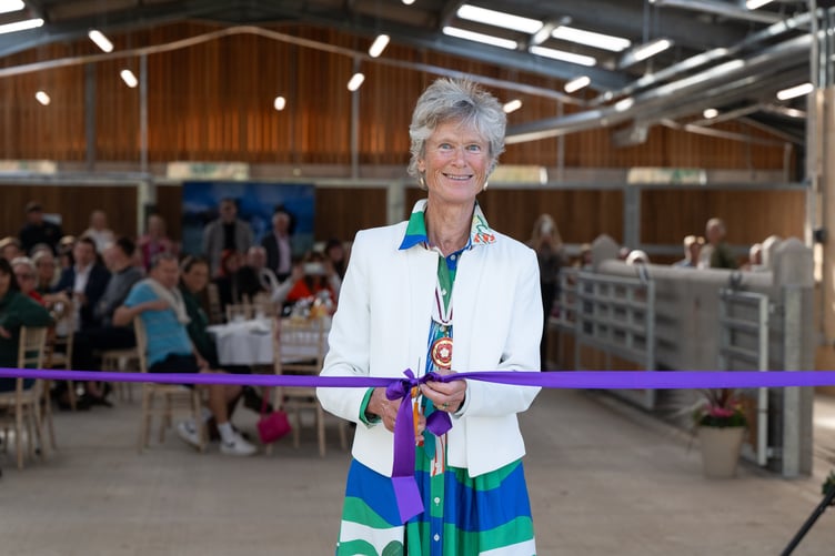 Deputy Lord Lieutenant of Devon Grania Phillips cut ting the ribbon at The Mare and Foal Sanctuary’s Rosemary Kind Barn